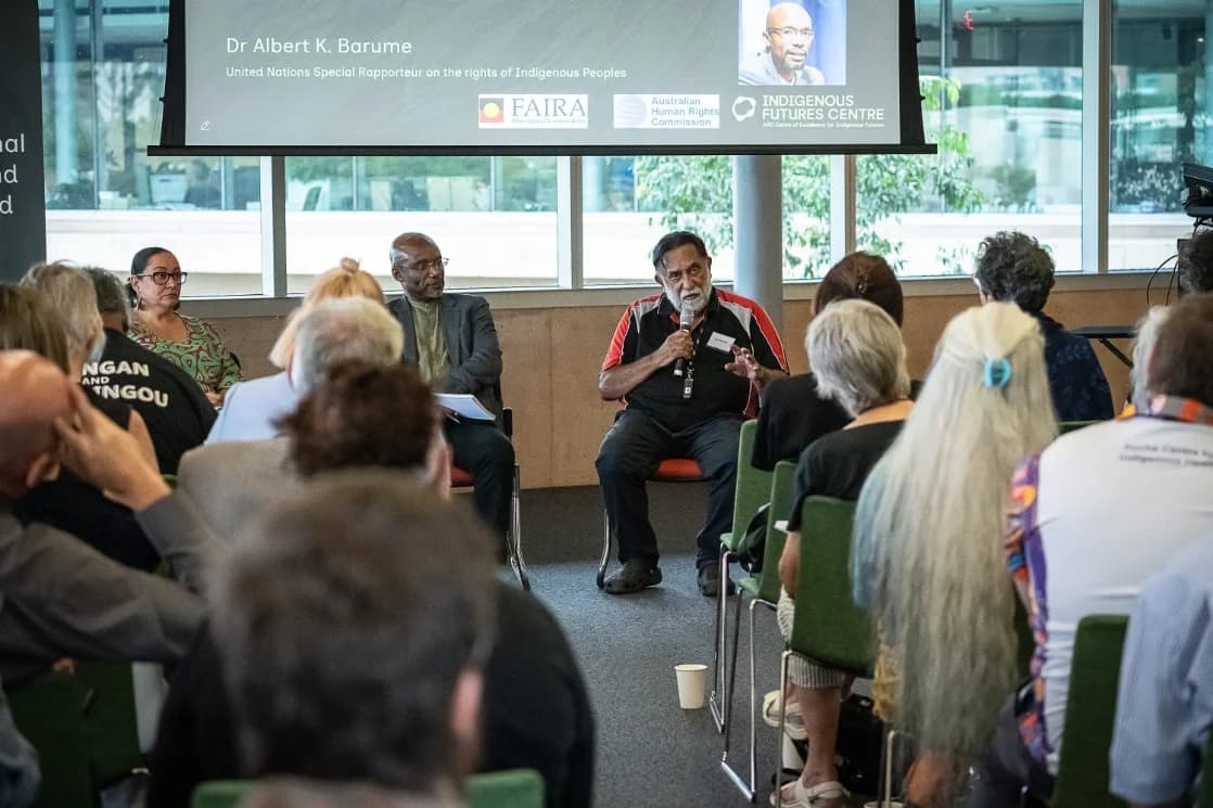 Workshop circle with leaders in conversation